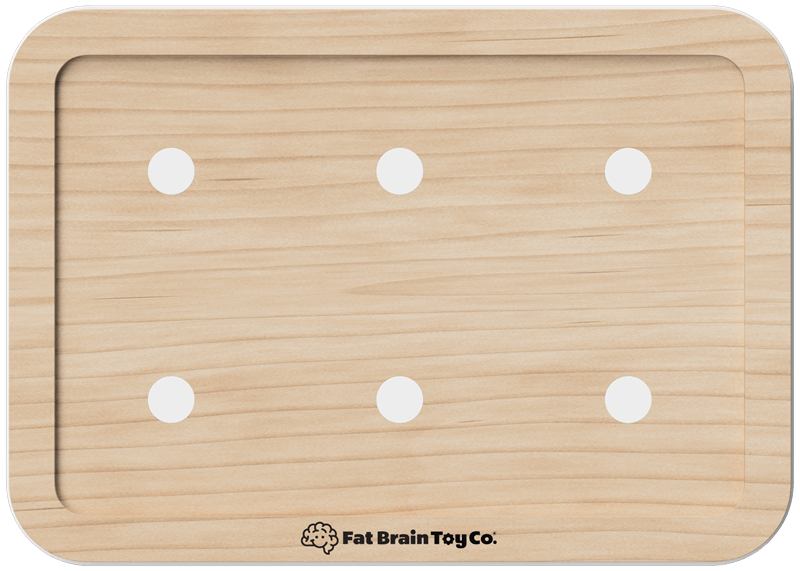 Wooden surface with white circular spots indicating the interior magnet and 'Fat Brain Toy Co.' branding