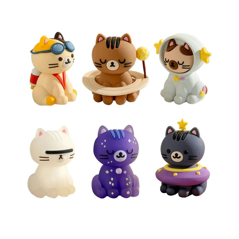 Set of six space-themed cat-shaped figurines with various accessories on a white background