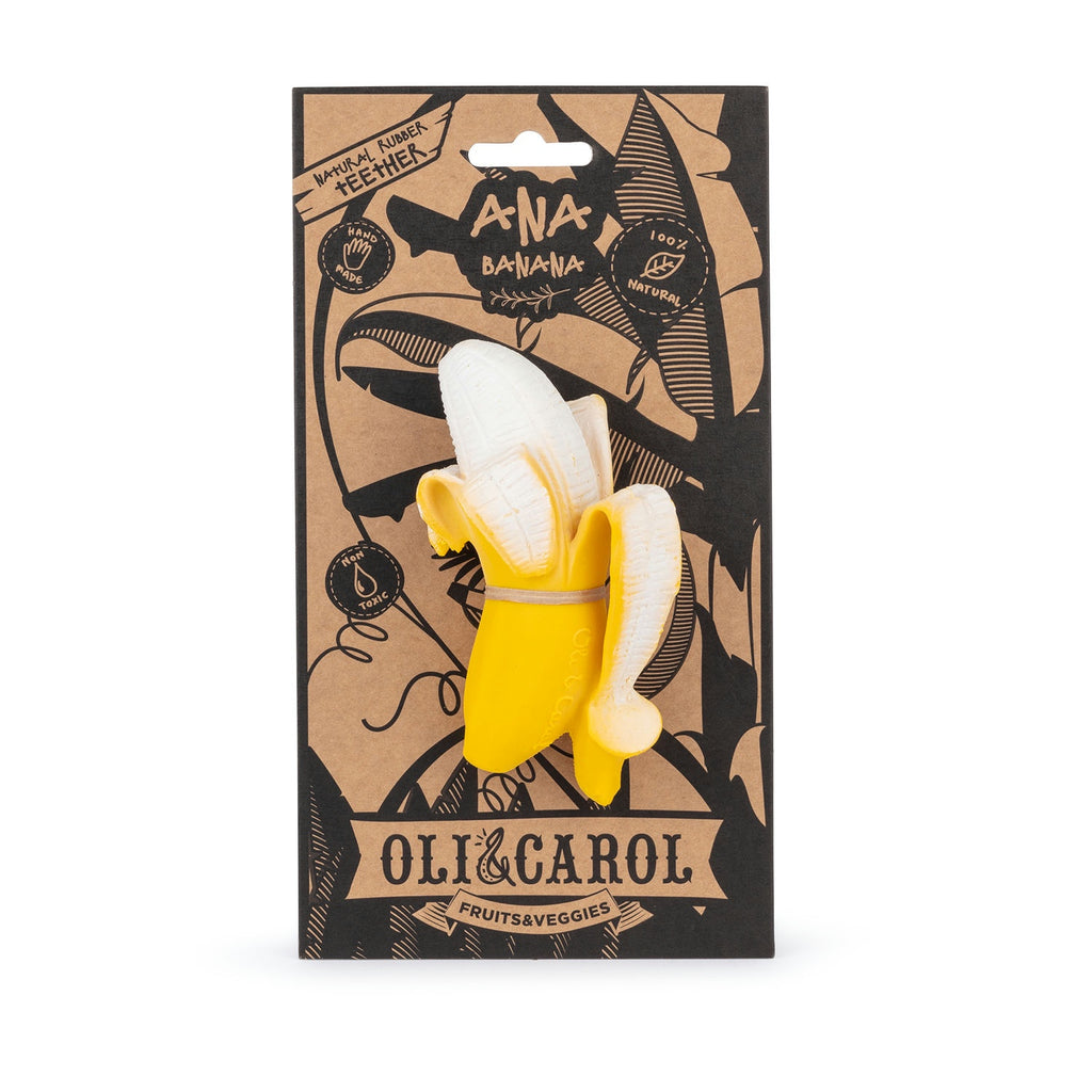 Banana-shaped toy in packaging with 'Oli & Carol' branding on a white background