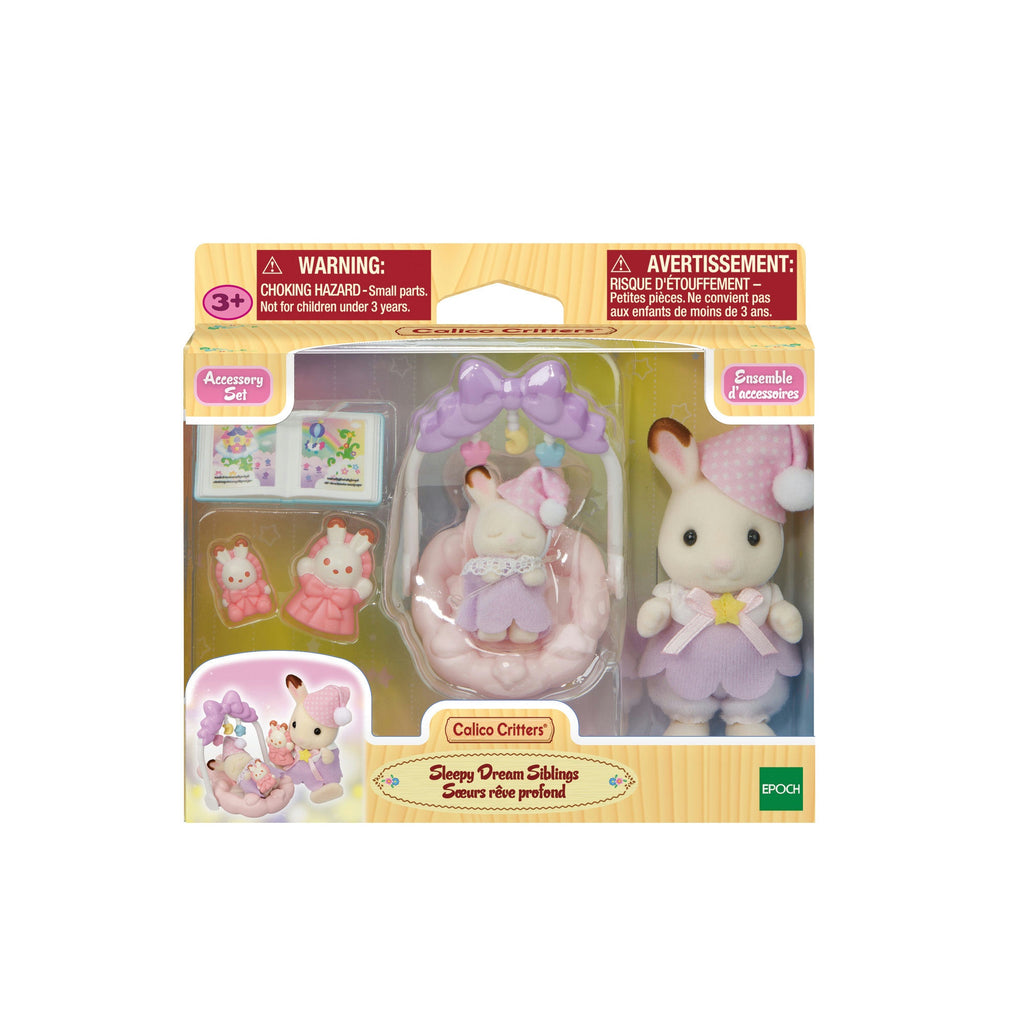 Boxed set of Calico Critters Sleepy Dream Siblings play set with warning labels on a white background