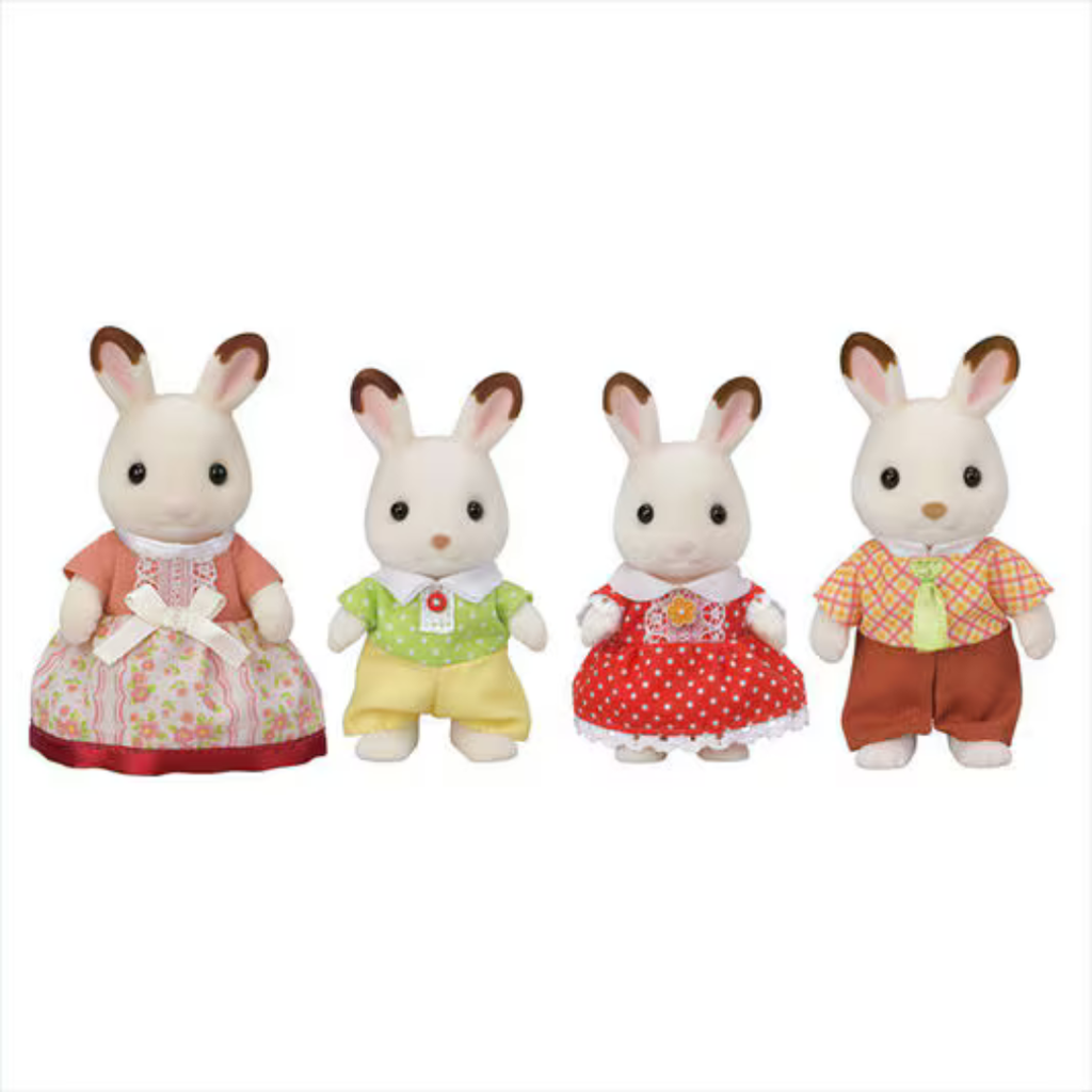 Four toy rabbit figures in colorful outfits on a white background
