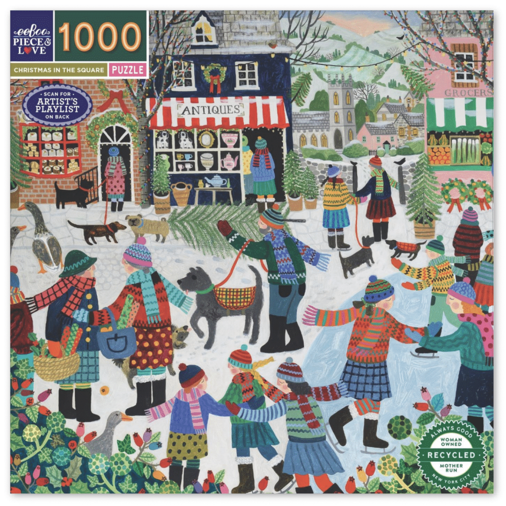Image of eeBoo Christmas in the Square 1000 piece puzzle packaging.  This artwork includes a town square filled with festive holiday activities such as skating, shopping, and spending time with the family.