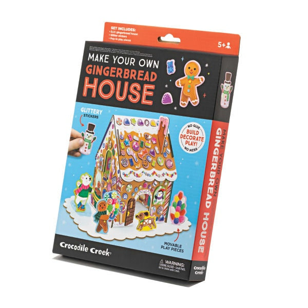 Packaging of Crocodile Creek make your own gingerbread house kit on a white background