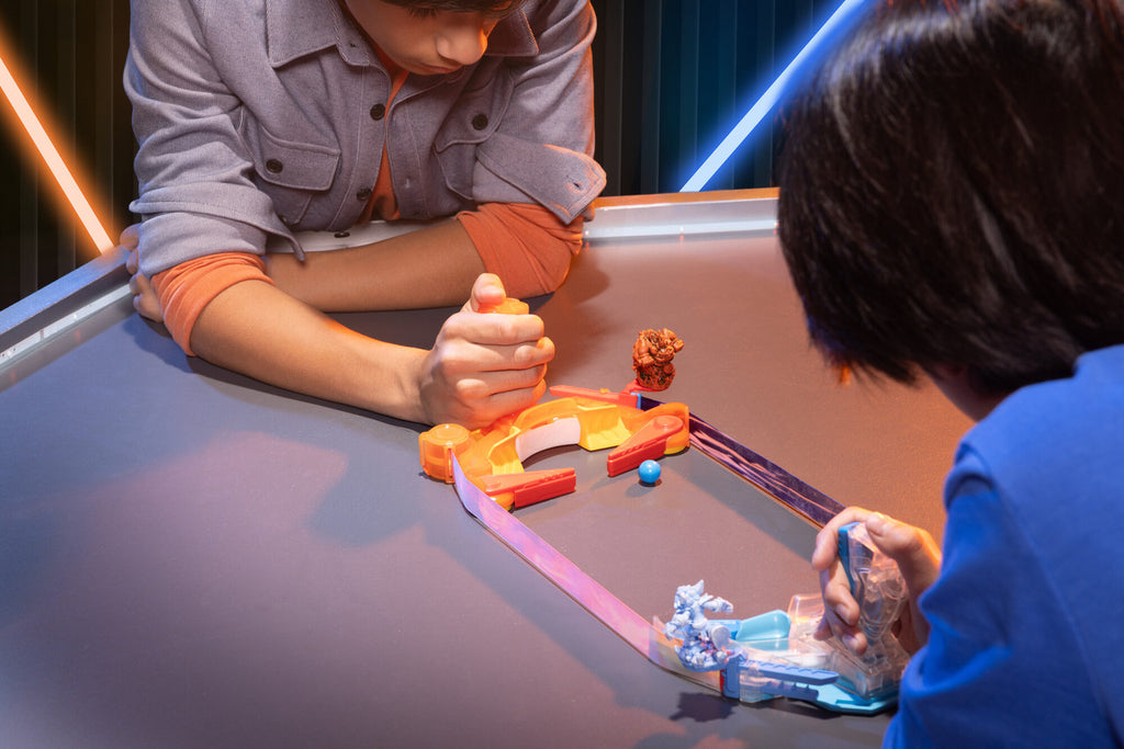 Image of two children playing with Doteki Multiplayer Battle Pack