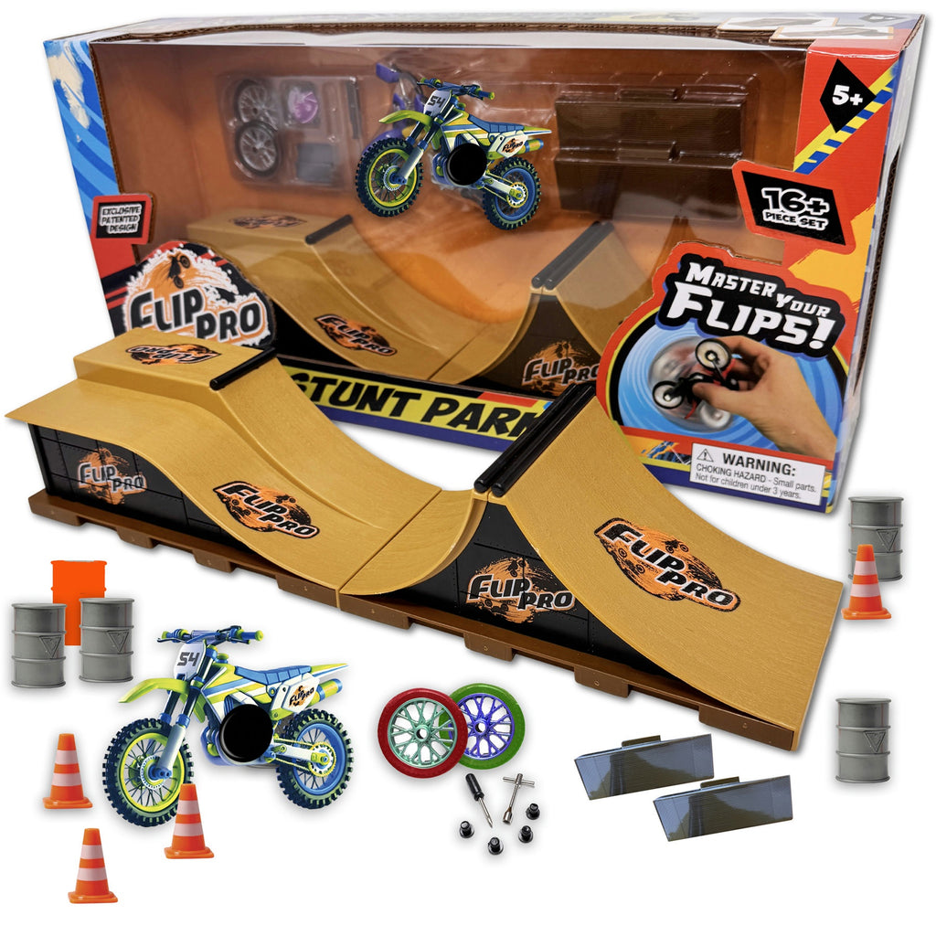 Toy stunt park set with two motorcycles, ramps, and accessories on a white background