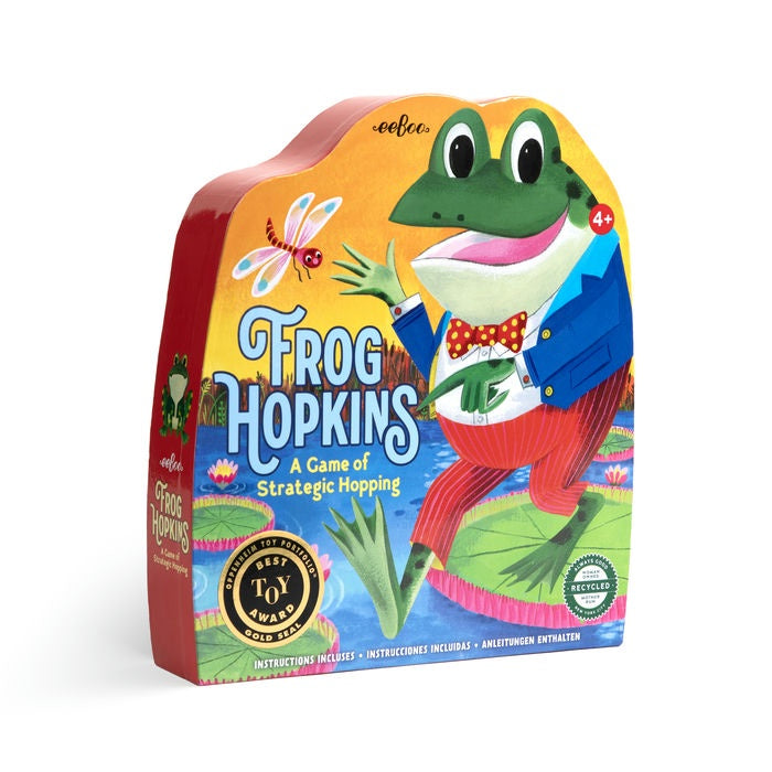 Colorful packaging of 'Frog Hopkins' game with a frog character on a white background
