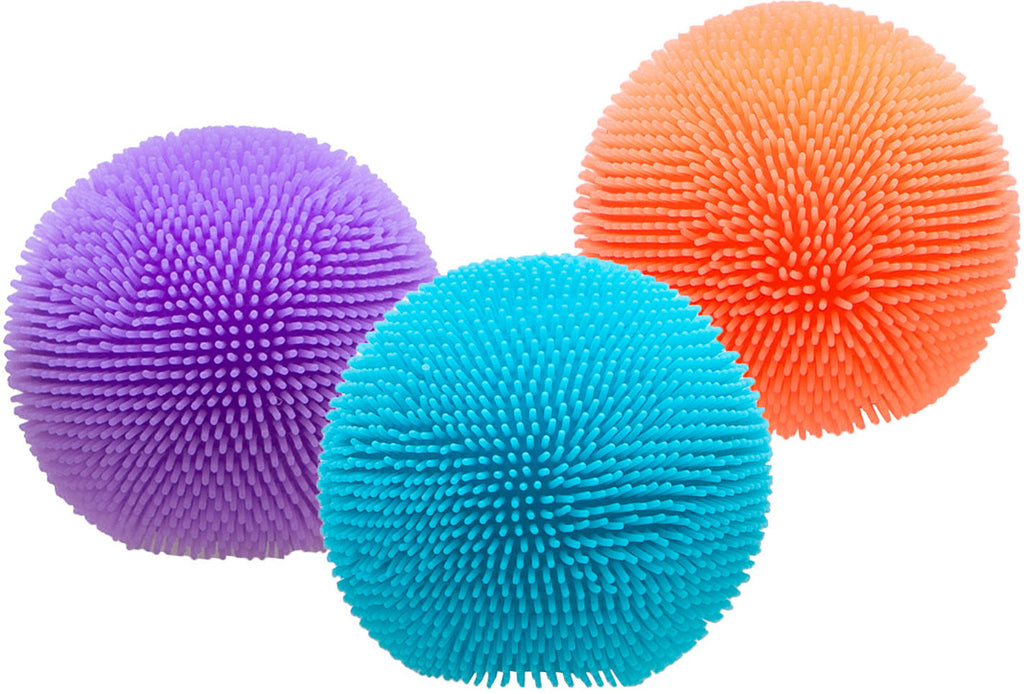 Three textured balls in purple, blue, and orange on a white background