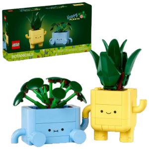 Two colorful plant-shaped toys with a LEGO box in the background