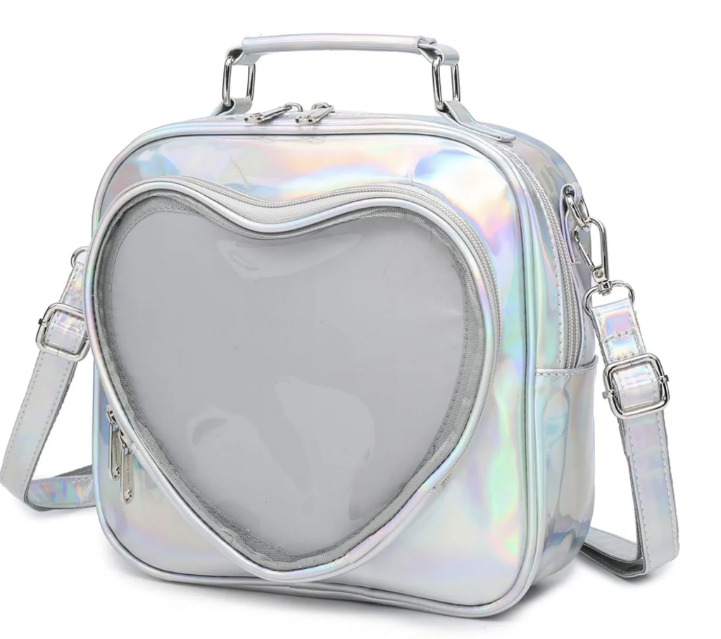 Holographic heart-shaped bag with a shoulder strap on a white background