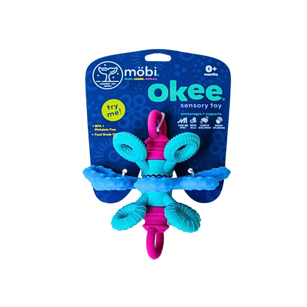 Blue and pink okee sensory toy with packaging on a white background