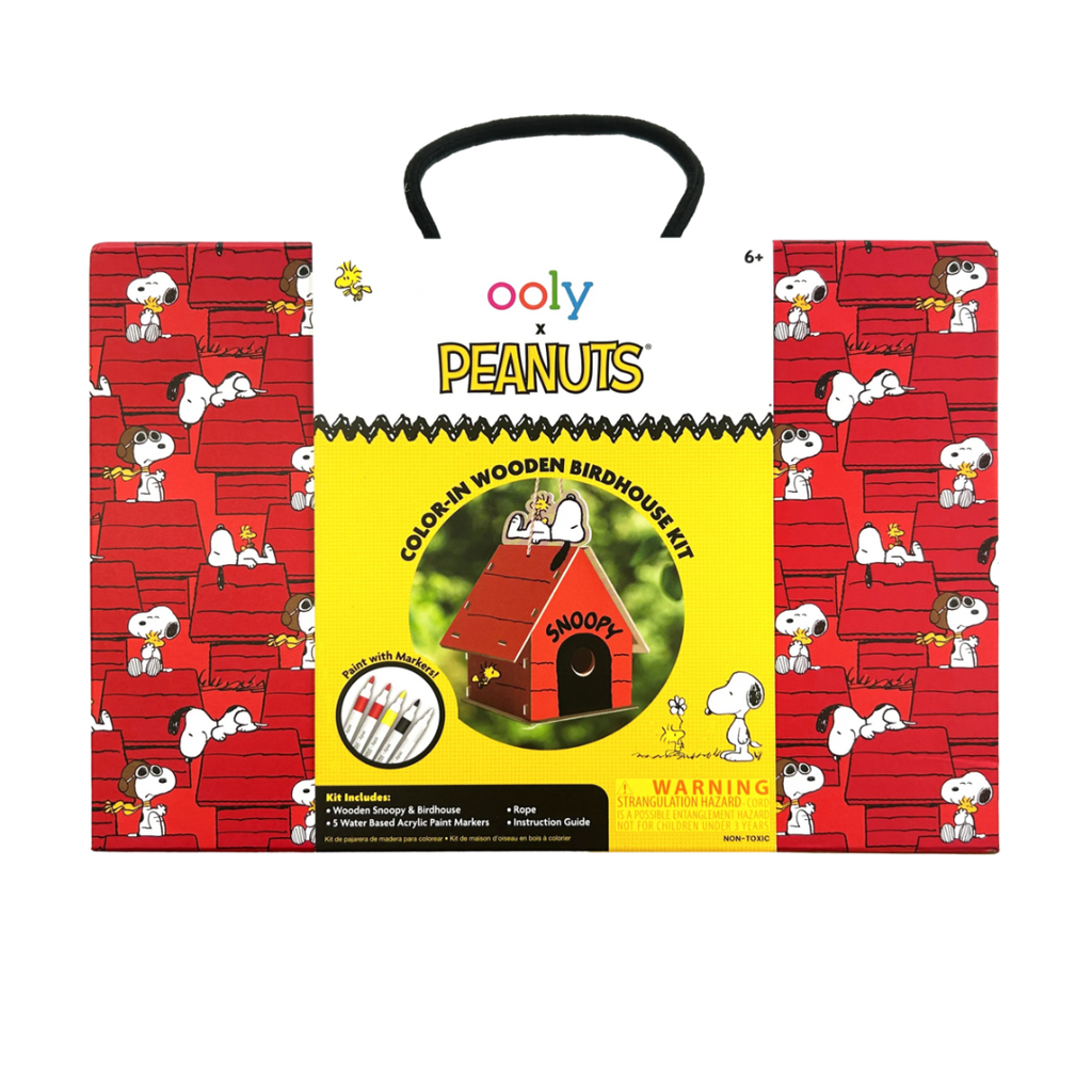 Ooly x Peanuts color-in wooden birdhouse kit packaging with Snoopy and Woodstock design.