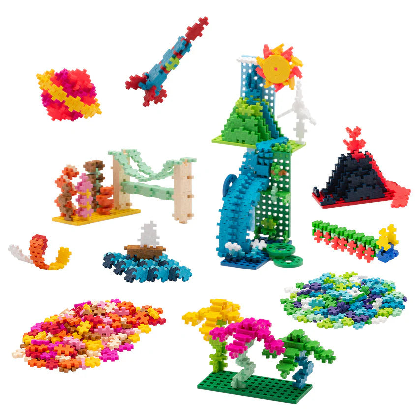 Assorted colorful building blocks on a white background