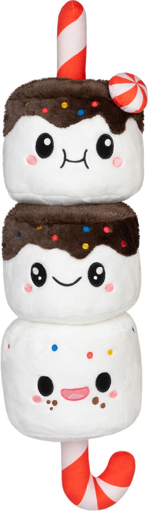 Stack of plush marshmallow characters with chocolate and candy cane toppings on a white background