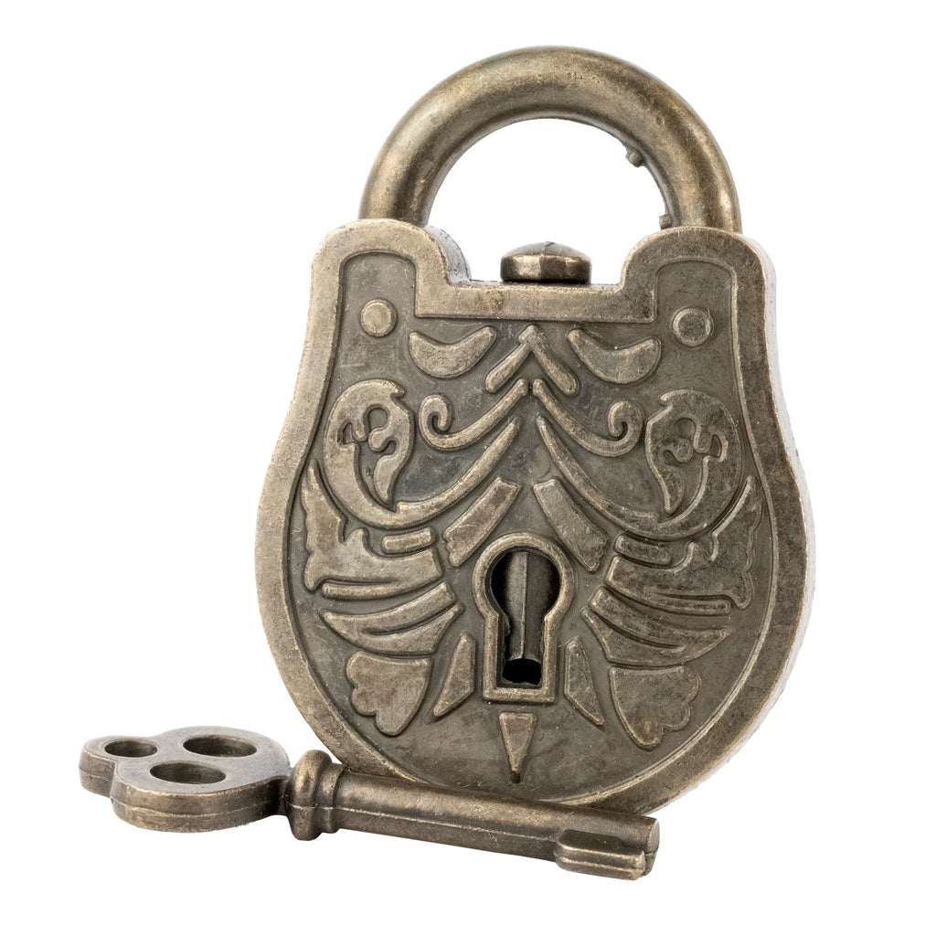Decorative toy puzzle brass padlock on a white background
