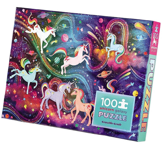 Jigsaw puzzle box with colorful unicorn design on a white background
