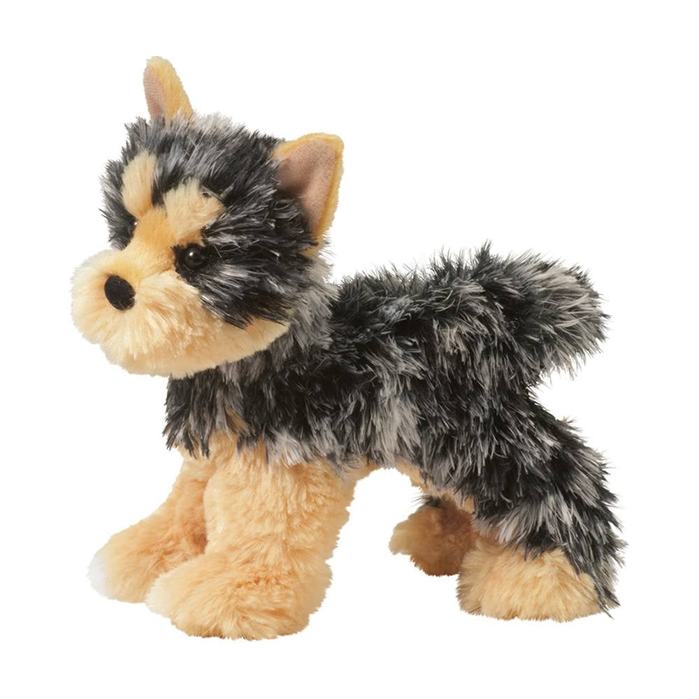 Plush toy dog with black and brown fur on a white background