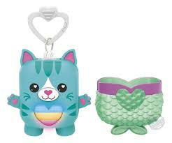 Two small plush toys with a cat-like design and fish-like design on a white background