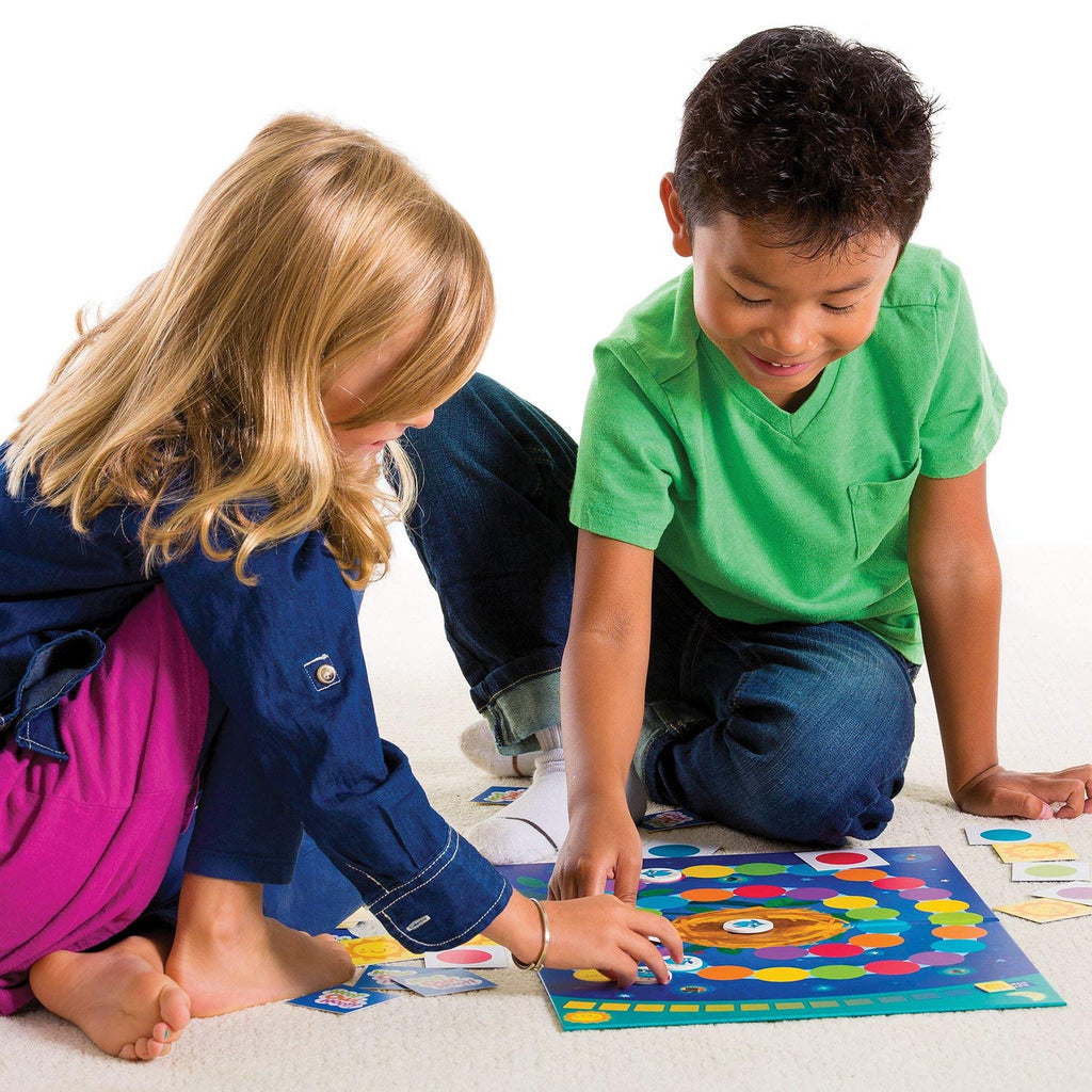 Image of 2 children playing Hoot Owl Hoot! board game