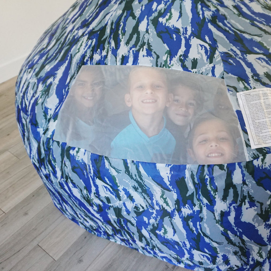 Image of children playing inside Ocean Camo AirFort