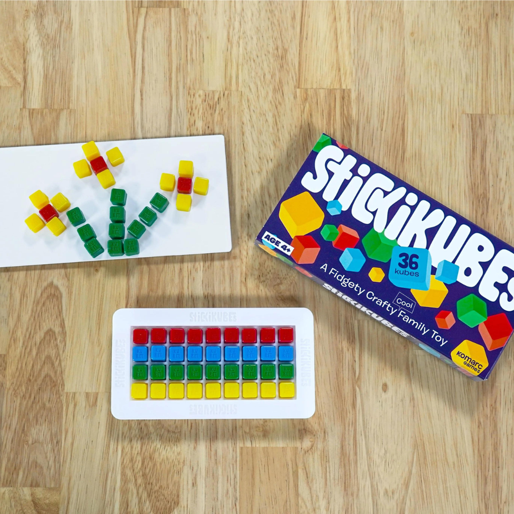 Image of Stickikubes, easel, and an image of a flower made using stickikubes