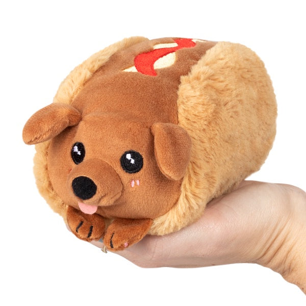 Image of Snugglemi Snackers - Hot Dog being held in a hand